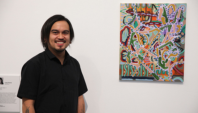 Artist Patrick Cruz with his award-winning work Time allergy