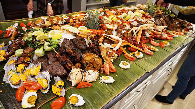 Kamayan or eating with hands means literally sharing a table with friends for a feast.