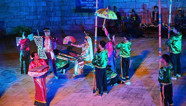 Philcas dancers perform the Idaw, a dance from the northern part of Luzon in the Cordillera region that represents a war ceremony. 