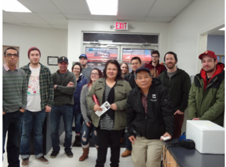 NIC aquaculture students at Centre for Aquatic Health Sciences (CAHS) in Campbell River for hands-on training identifying and analyzing fish diseases. On the foreground is Dr. Ronquillo.