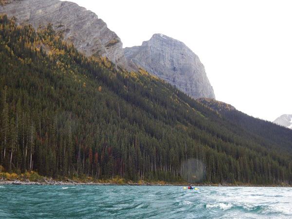 Paddling through wind and choppy waters.